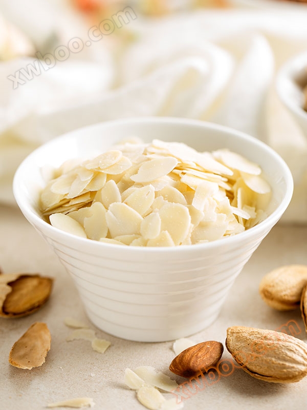 适用于各种坚果切片的设备，效率高，厚度可调。